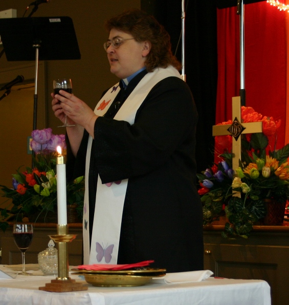 Margaret serving communion